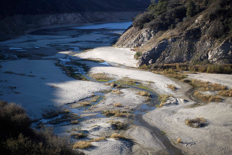 Illustration for article titled Flooded Ghost Towns Re-Emerge as Water Levels Drop Across the West